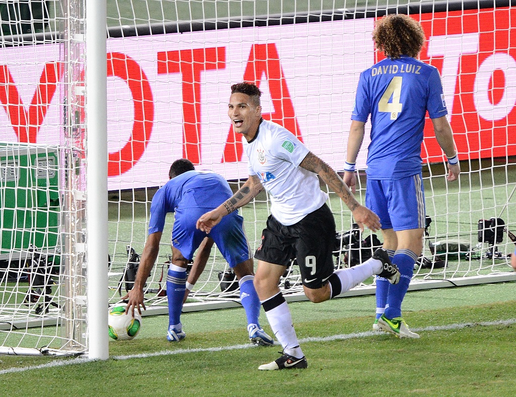 Brazil's Corinthians forward Paolo Guerrero (C) reacts after scoring a goal against English Premier League team Chelsea during their 2012 Club World Cup football final match in Yokohama on December 16, 2012.       AFP PHOTO/Toru YAMANAKA        (Photo credit should read TORU YAMANAKA/AFP via Getty Images)